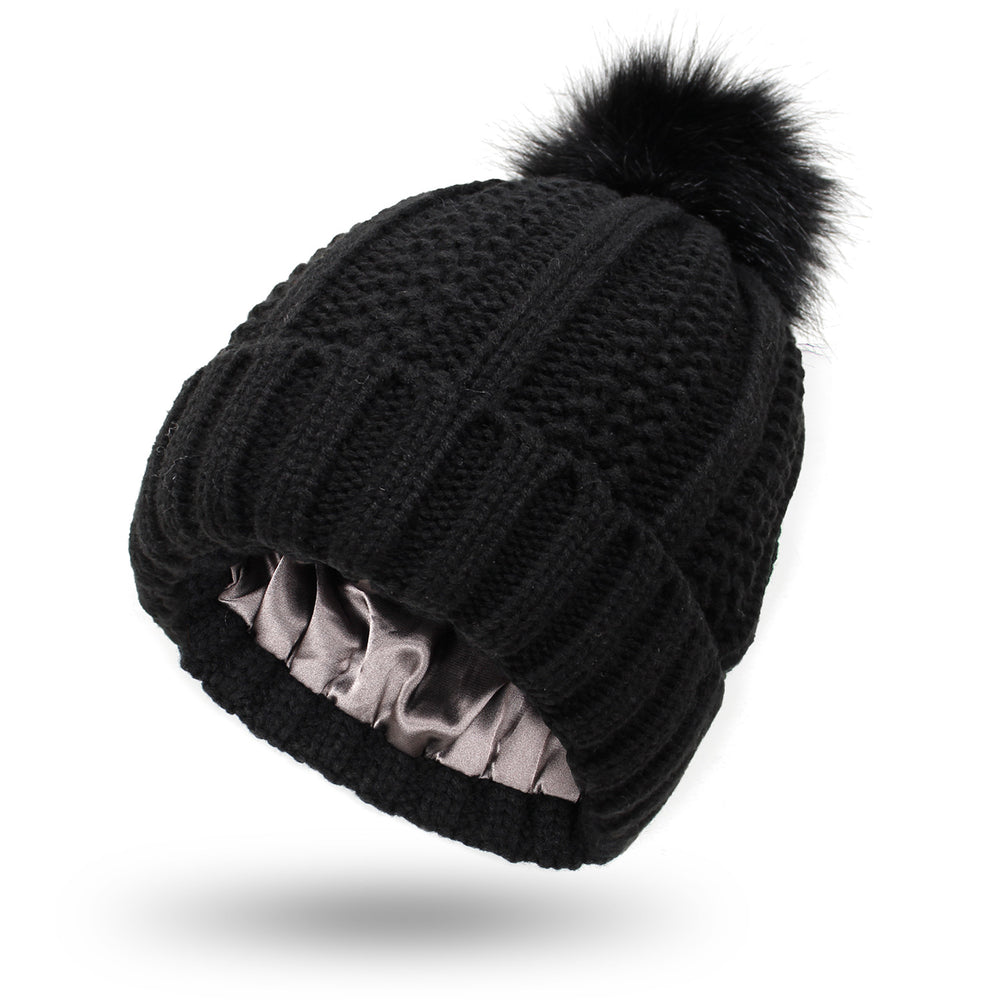 Damska czapka z pomponem z grubej dzianiny